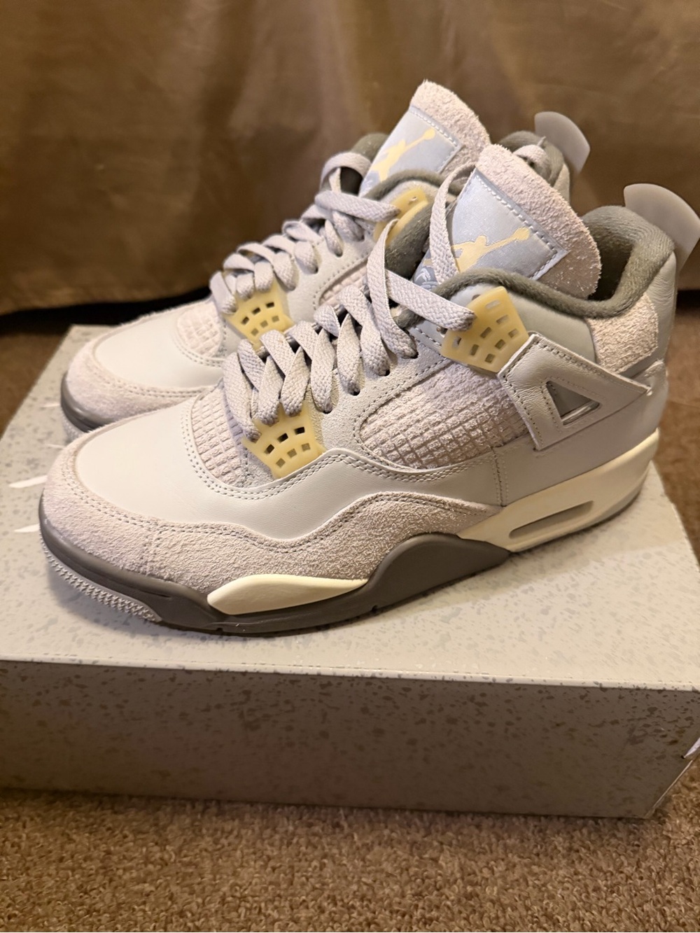 Jordan Retro 4 Sneakers - Light Gray & Cream Accents